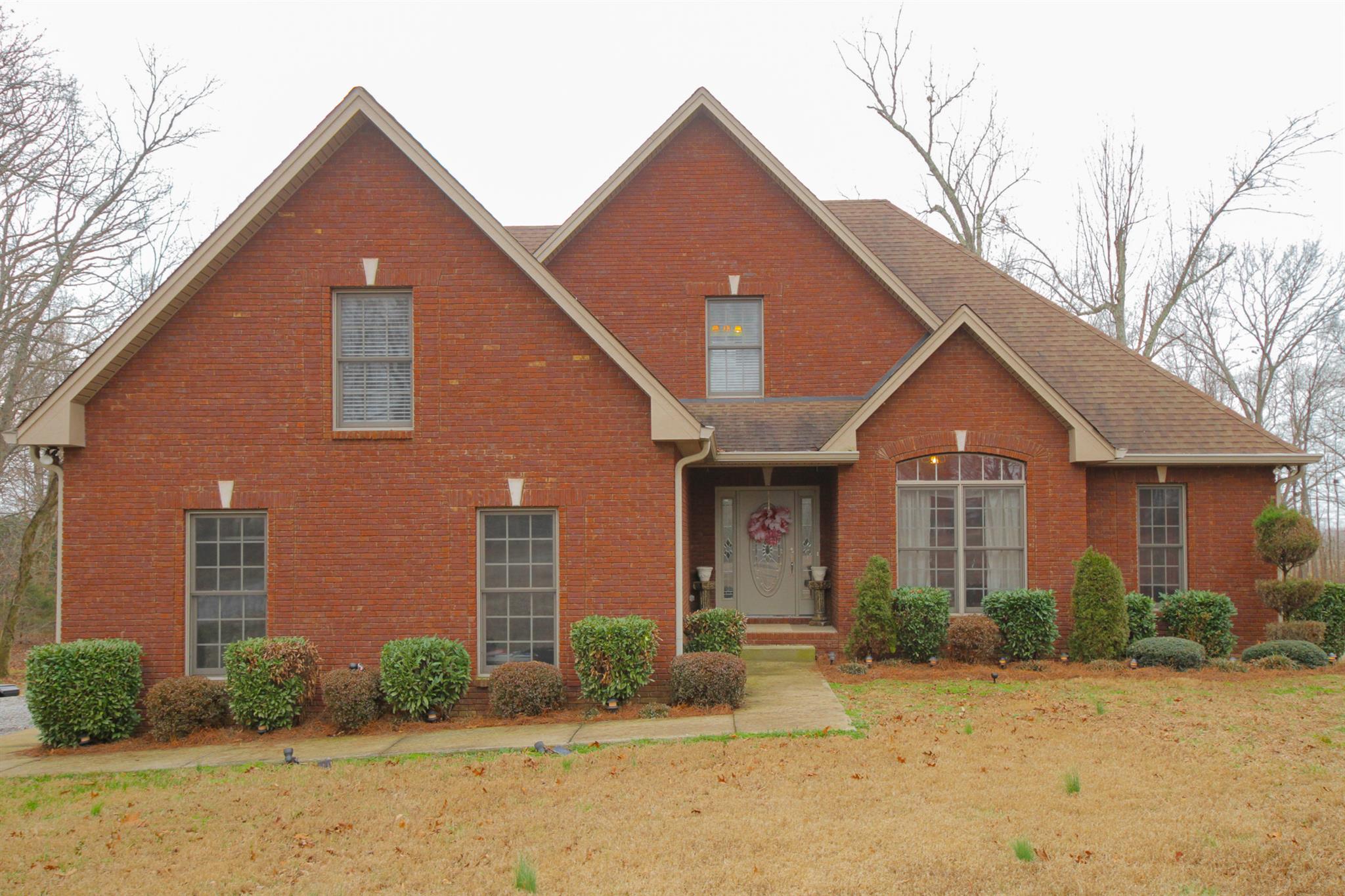 3463 Ott Wilson Road Springfield, TN 37172 - Photo 1 of 30 a front view of a house with garden