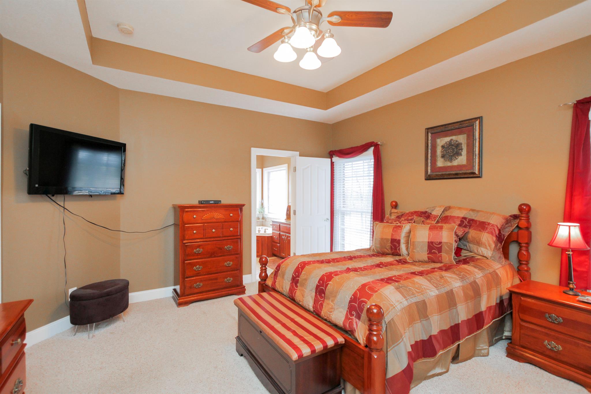 3463 Ott Wilson Road Springfield, TN 37172 - Photo 16 of 30 a bedroom with a bed and a flat screen tv