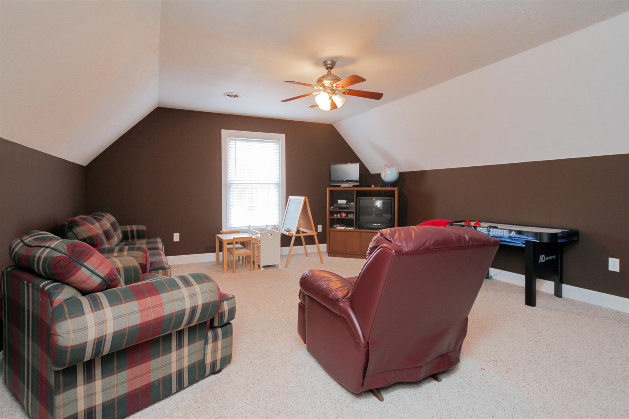 3463 Ott Wilson Road Springfield, TN 37172 - Photo 23 of 30 a living room with furniture and a fireplace