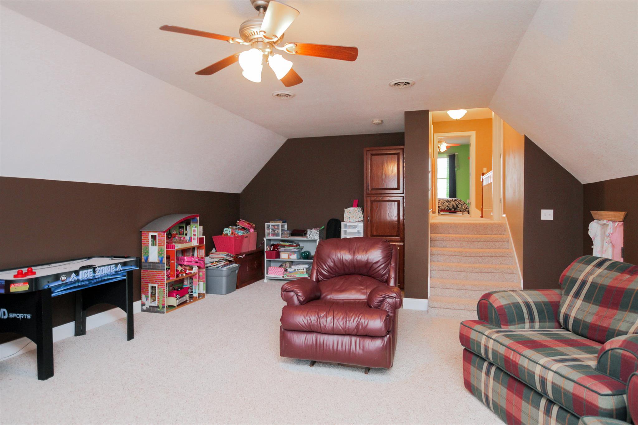 3463 Ott Wilson Road Springfield, TN 37172 - Photo 24 of 30 a living room with furniture and a chandelier