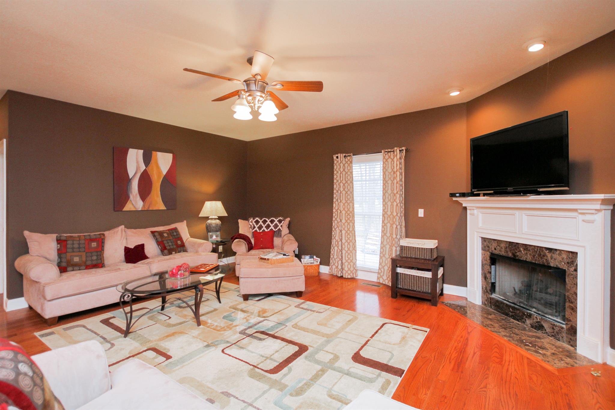 3463 Ott Wilson Road Springfield, TN 37172 - Photo 5 of 30 a living room with furniture and a flat screen tv