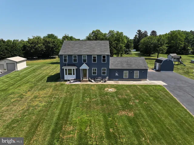 a view of a house with a big yard