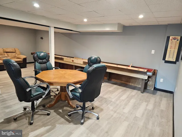 a view of a workspace with furniture