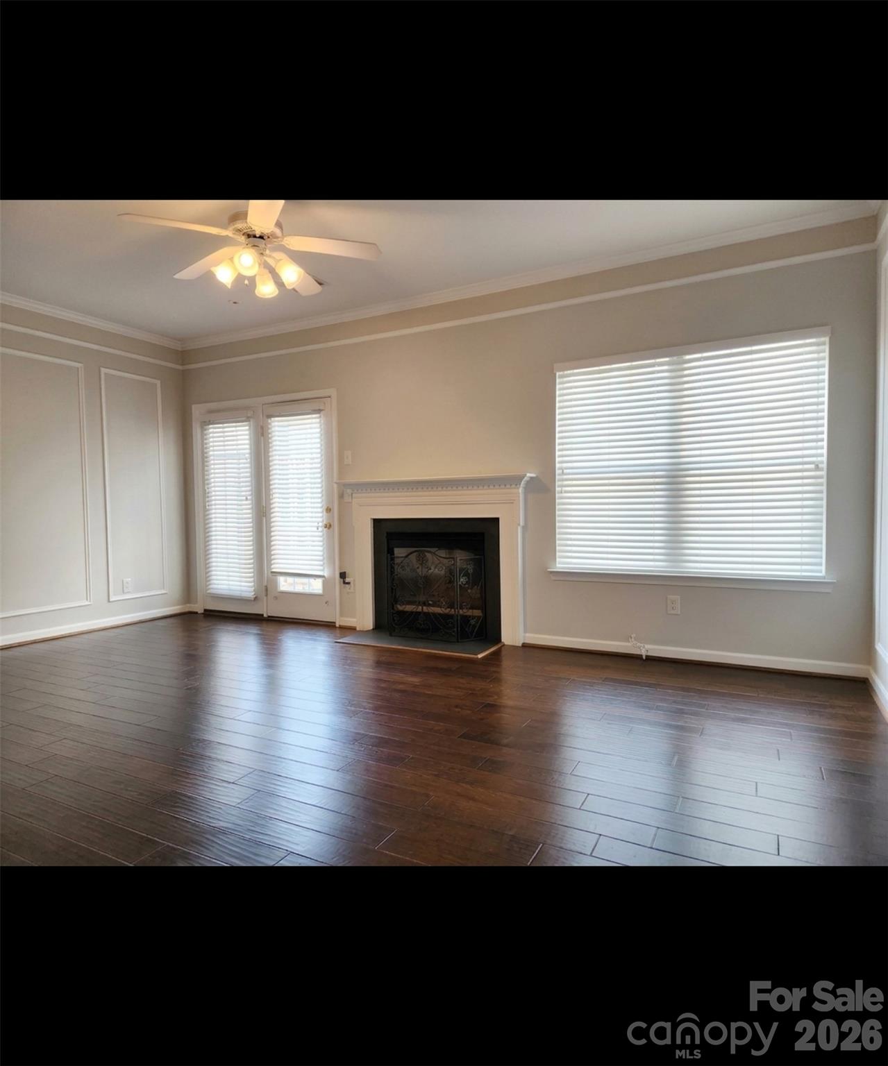 104 Rock Ridge Lane Mount Holly, NC 28120 - Photo 16 of 44 a view of empty room with window and fireplace
