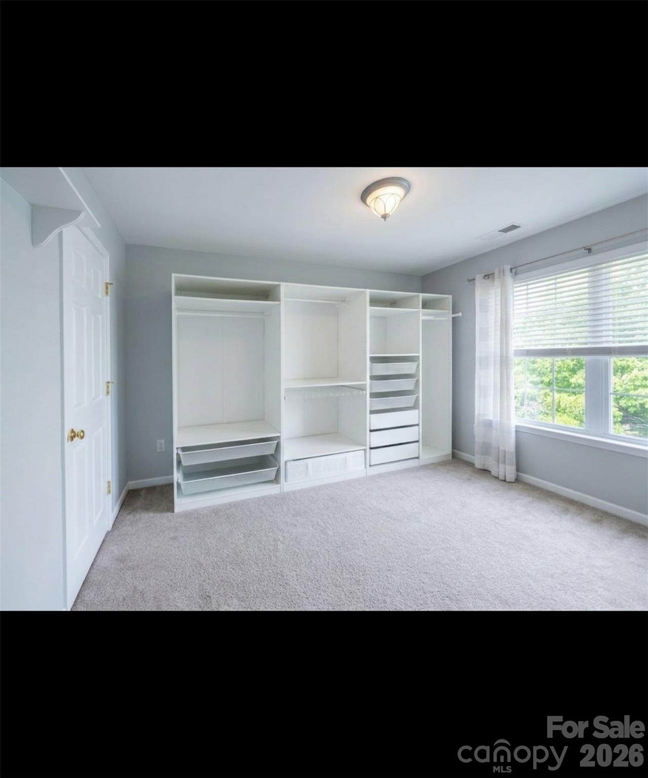 104 Rock Ridge Lane Mount Holly, NC 28120 - Photo 28 of 44 a view of an empty room with a window