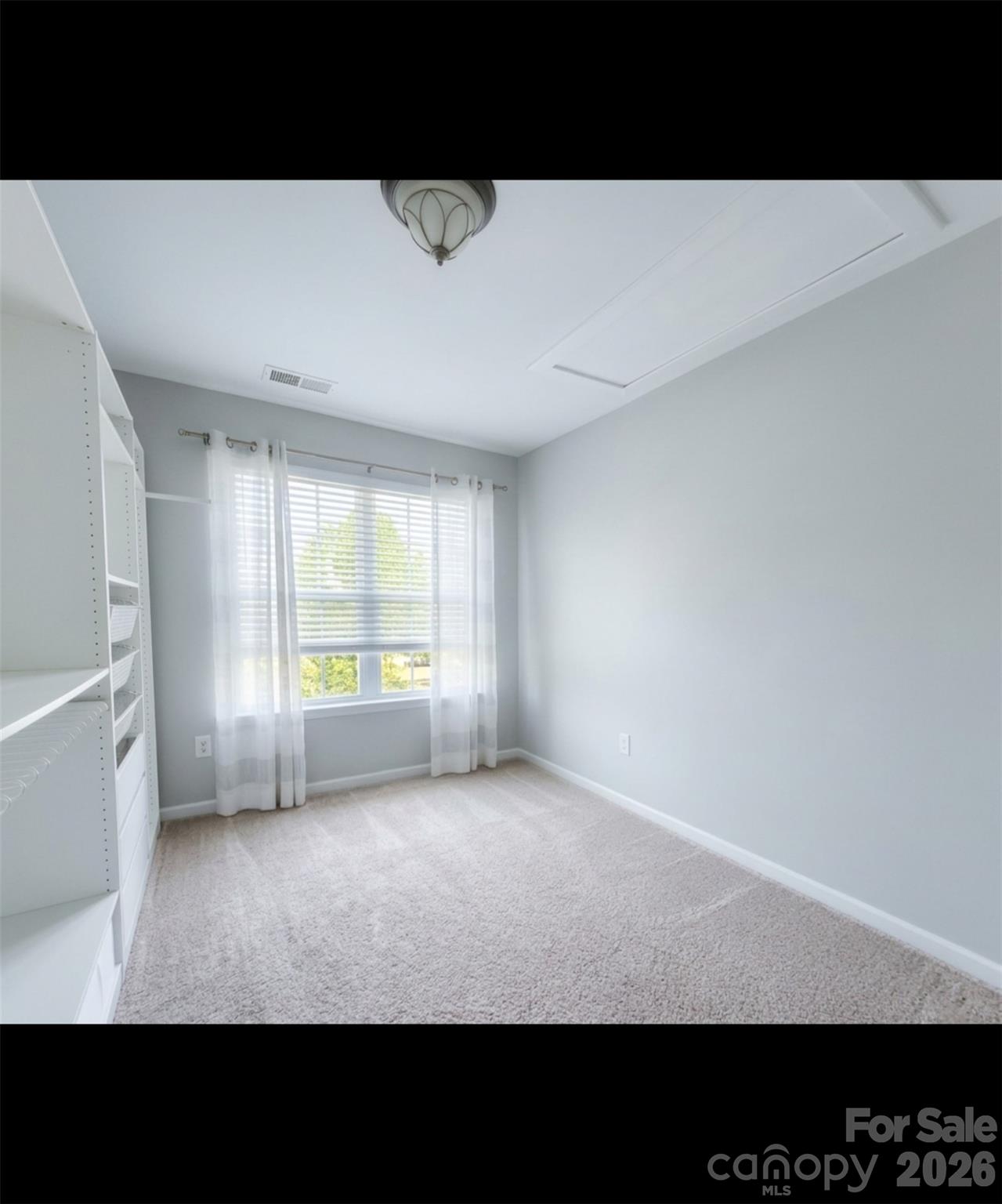 104 Rock Ridge Lane Mount Holly, NC 28120 - Photo 29 of 44 a view of an empty room with a window
