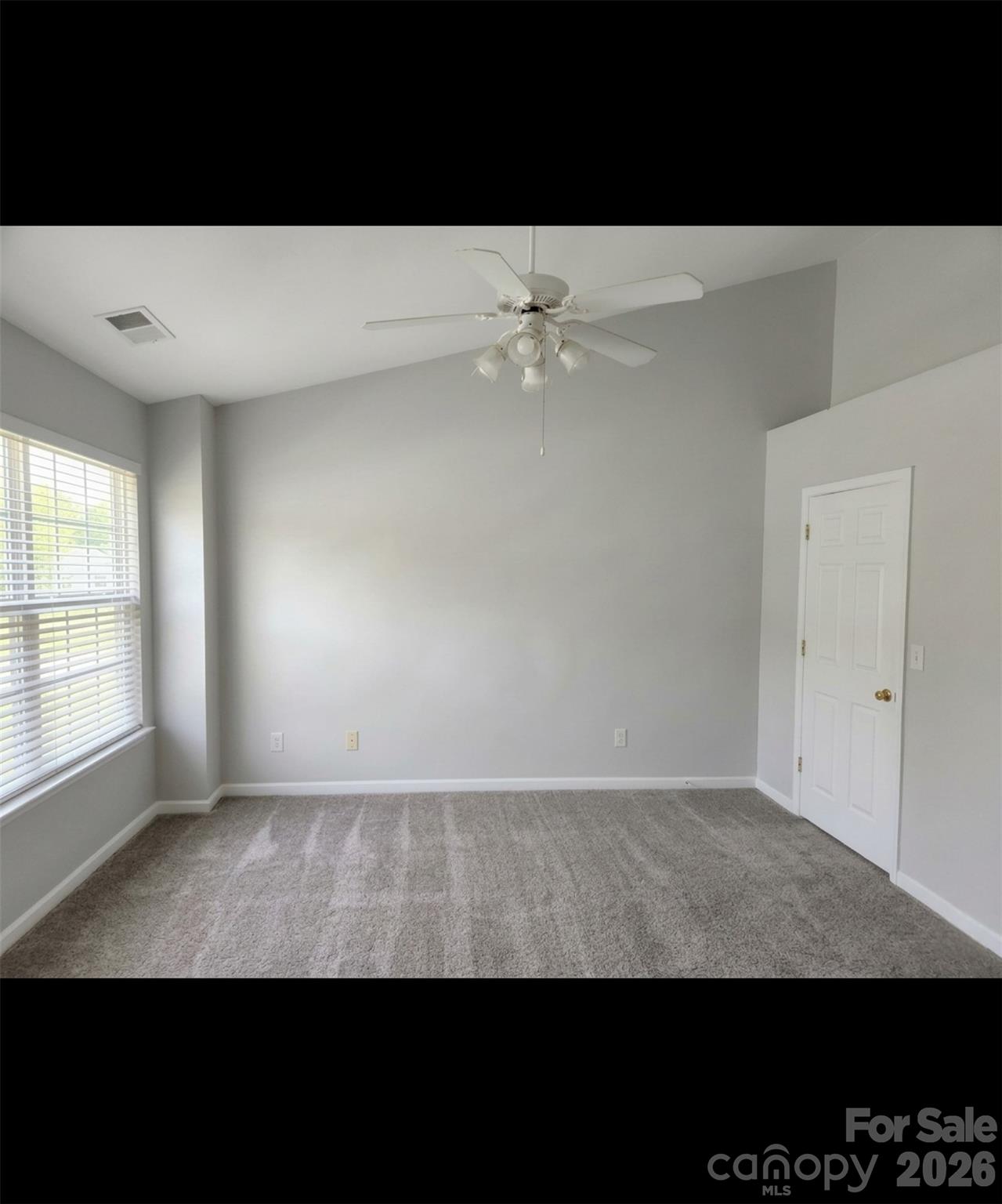 104 Rock Ridge Lane Mount Holly, NC 28120 - Photo 31 of 44 a view of an empty room with a window
