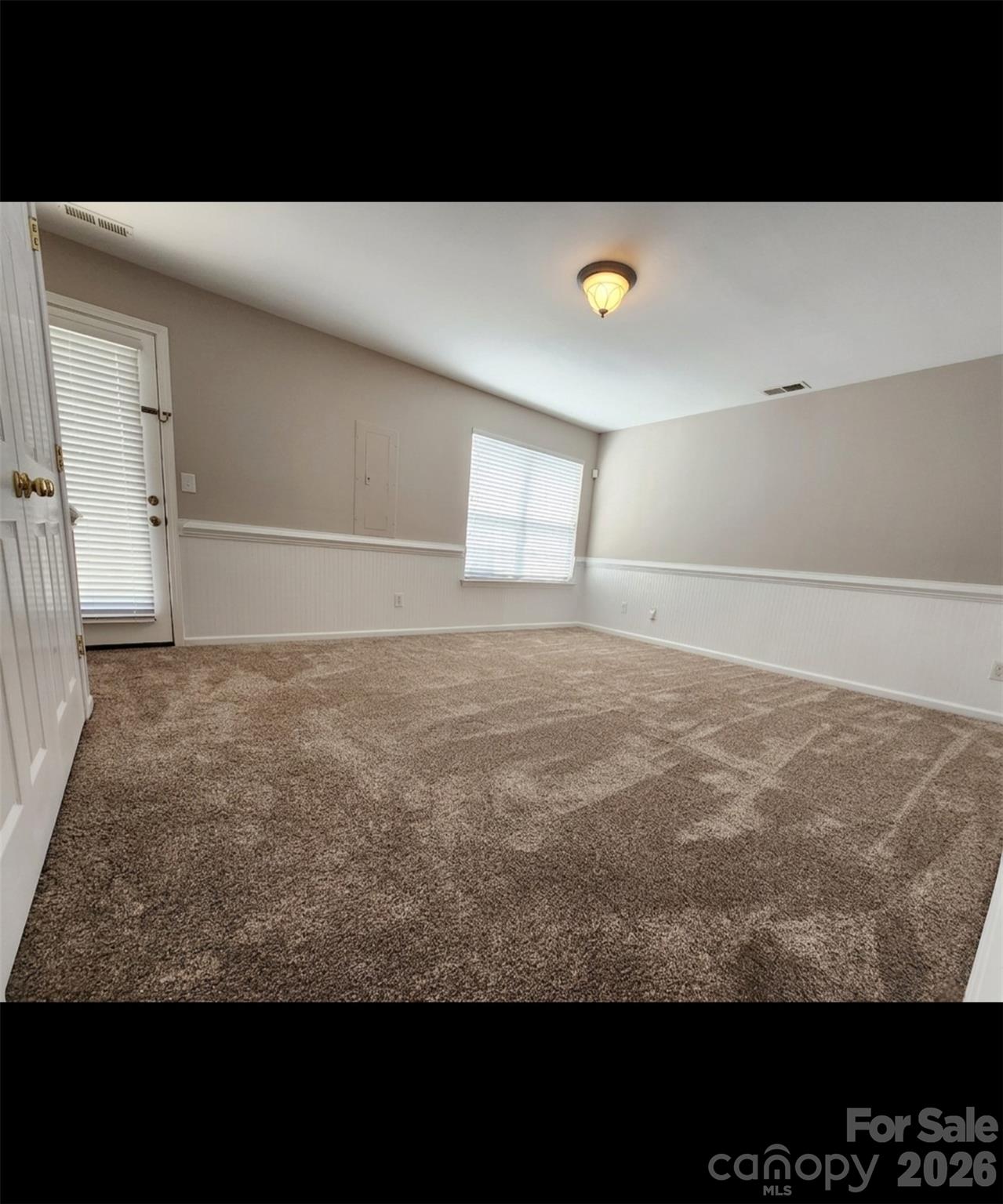 104 Rock Ridge Lane Mount Holly, NC 28120 - Photo 5 of 44 a view of a room with an empty space