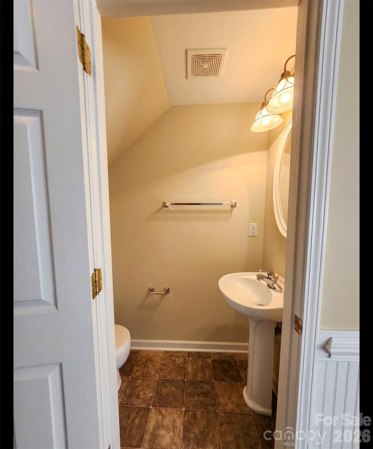 104 Rock Ridge Lane Mount Holly, NC 28120 - Photo 10 of 44 a bathroom with a sink and toilet