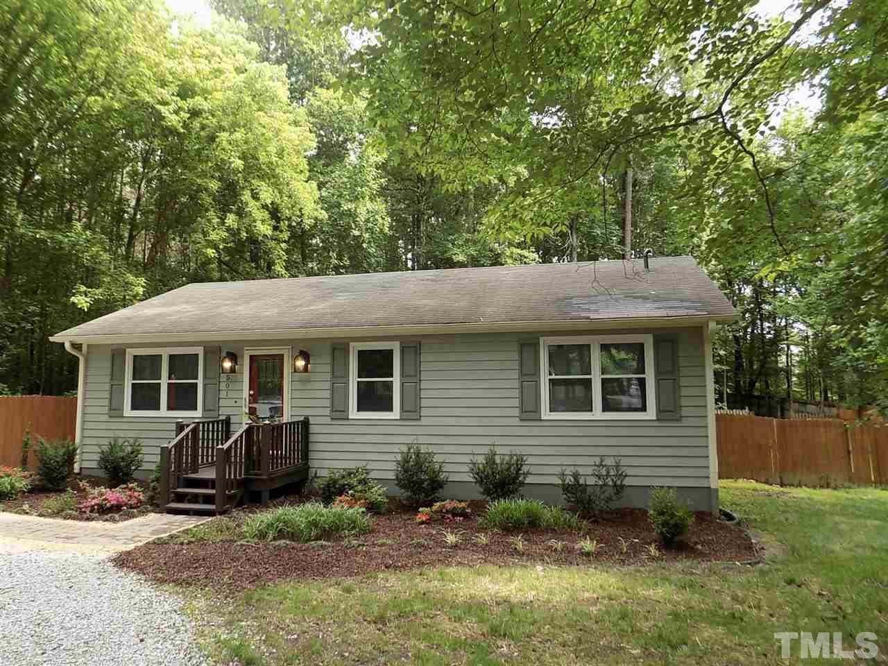 501 Lakeview Road Durham, NC 27712 - Photo 3 of 22 front view of a house with a yard