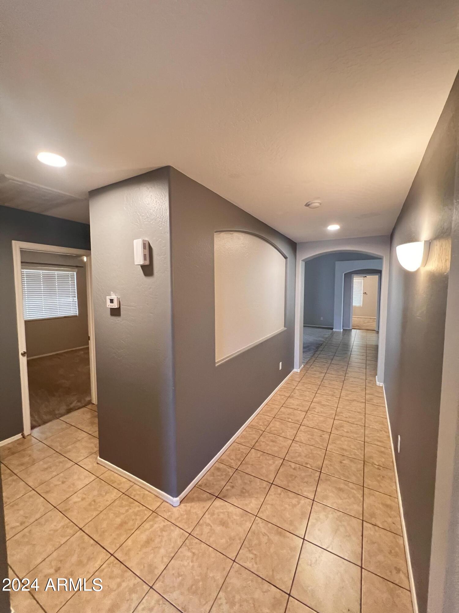 3797 East Ironhorse Road Gilbert, AZ 85297 - Photo 17 of 22 a view of hallway with stairs
