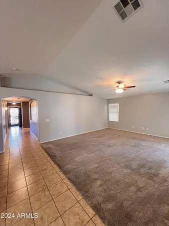 a view of an empty room with window