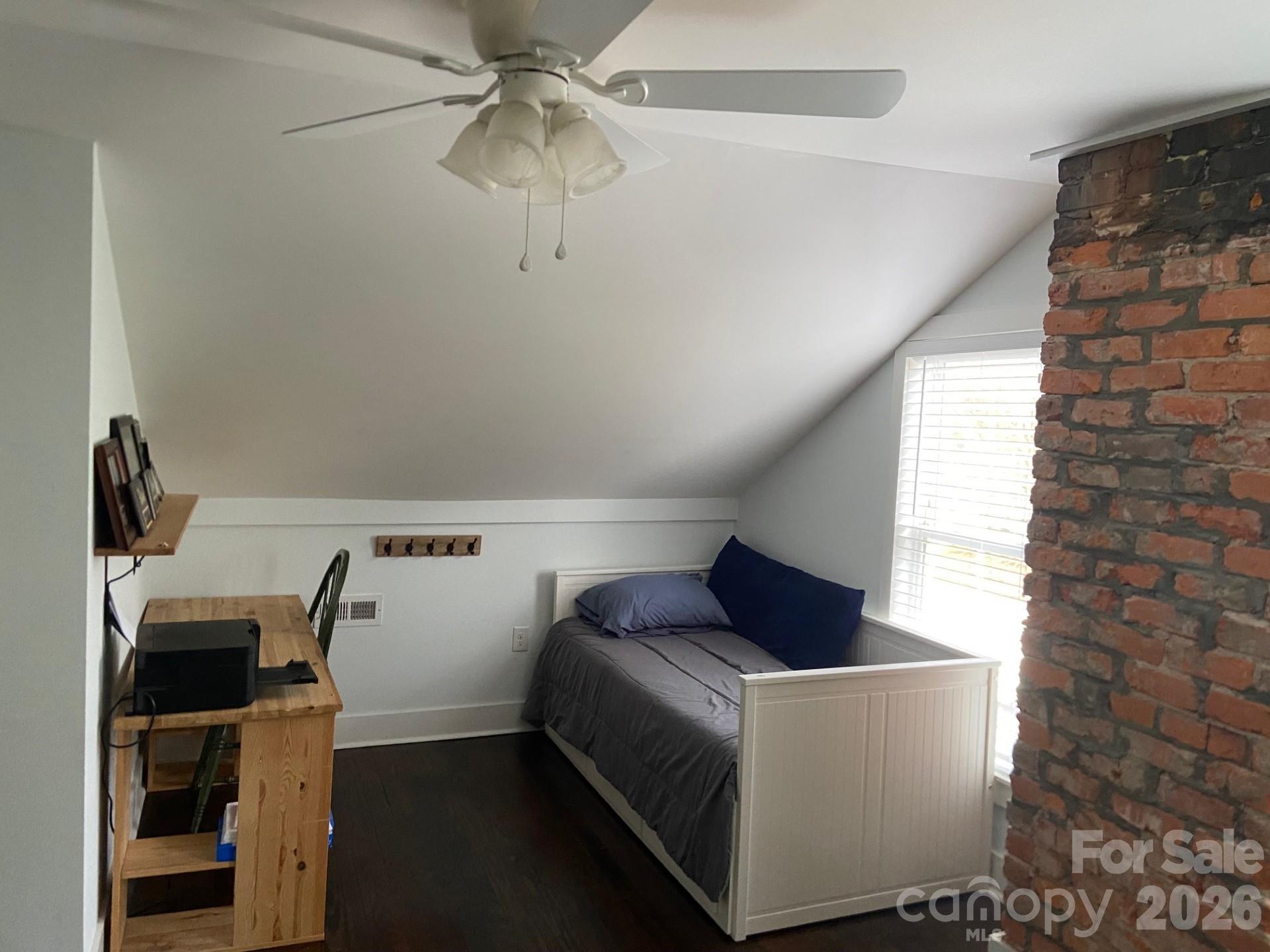 201 Main Street Matthews, NC 28105 - Photo 16 of 16 a living room with furniture and a window