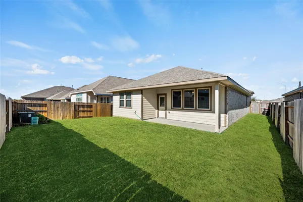 a view of a yard in front of house