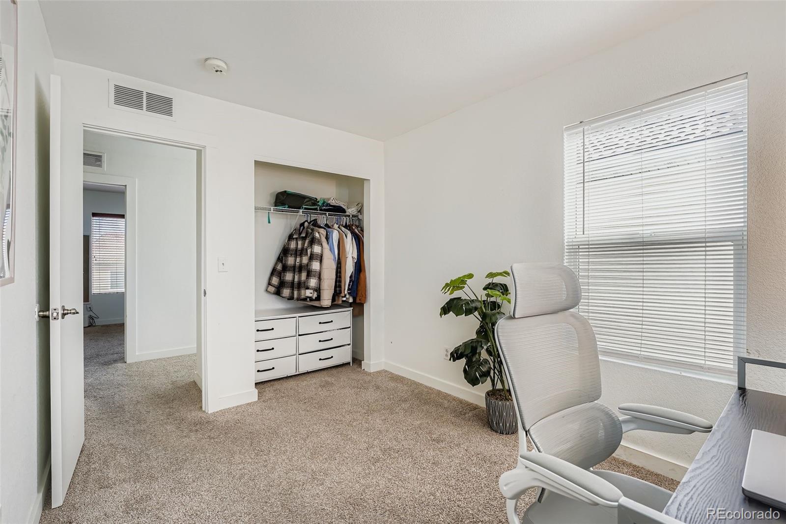 4250 Perth Circle Denver, CO 80249 - Photo 25 of 31 a view of living room with furniture and a potted plant