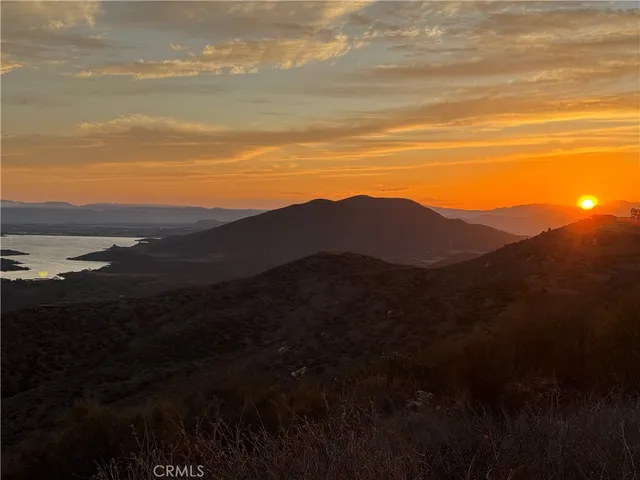 a view of mountain with sunset view
