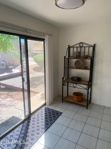 a bathroom with a sink vanity mirror and toilet