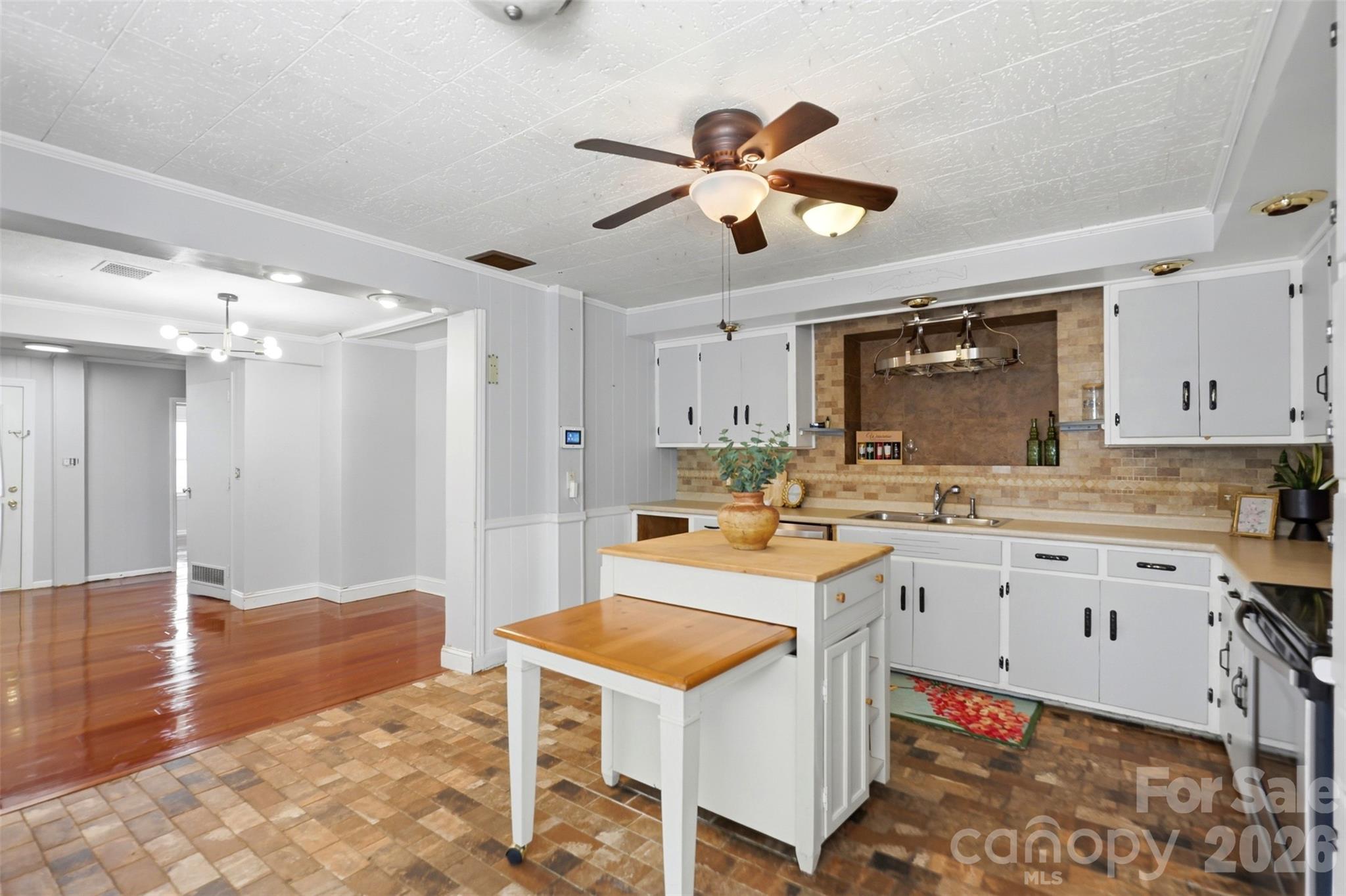 2670 North Olivers Road Newton, NC 28658 - Photo 13 of 27 a kitchen with cabinets a sink and appliances