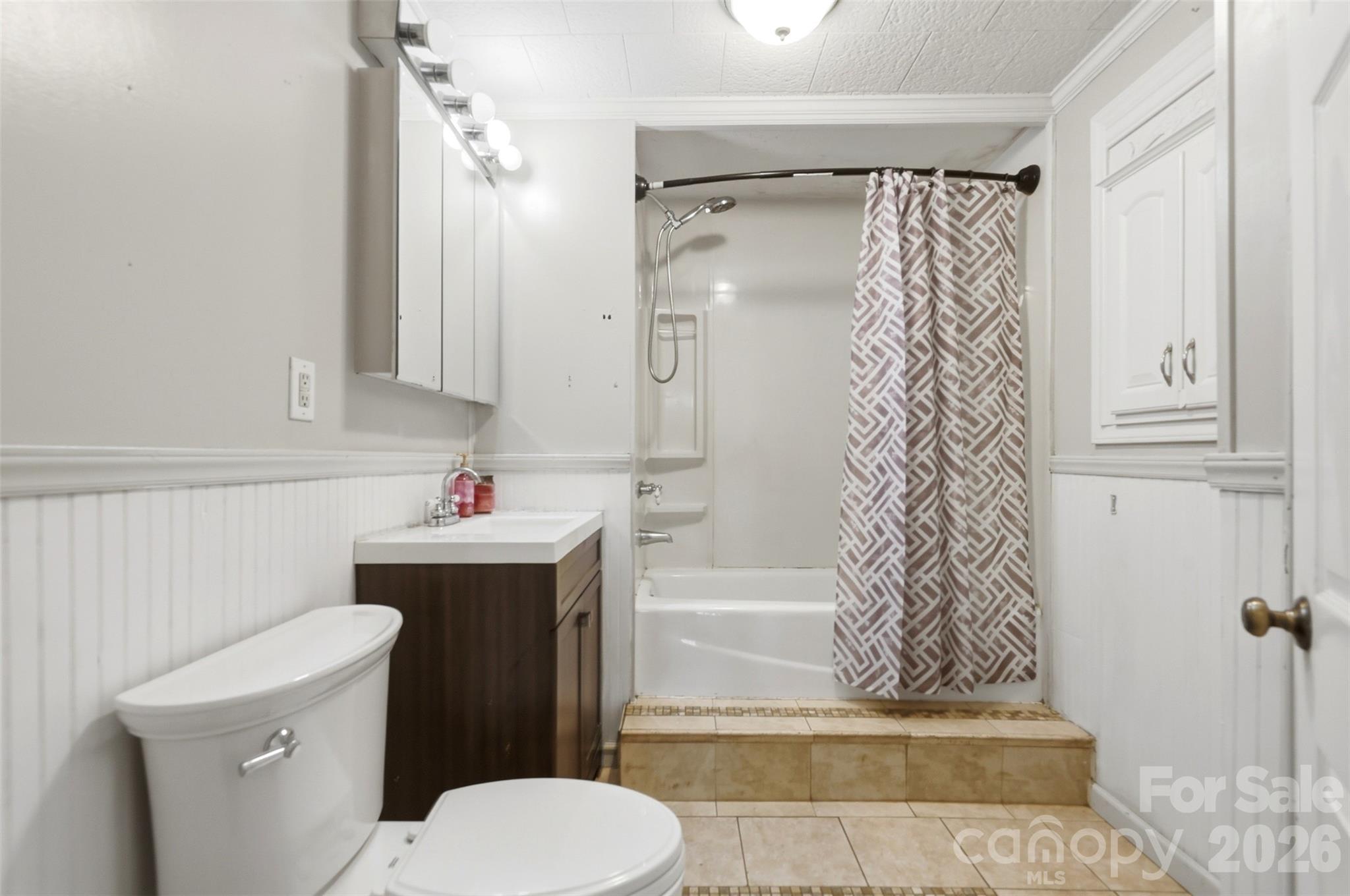 2670 North Olivers Road Newton, NC 28658 - Photo 18 of 27 a bathroom with a sink toilet and shower