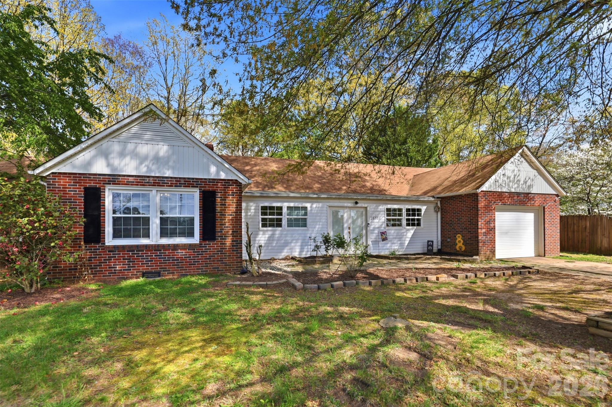 2670 North Olivers Road Newton, NC 28658 - Photo 2 of 27 a house with trees in the background