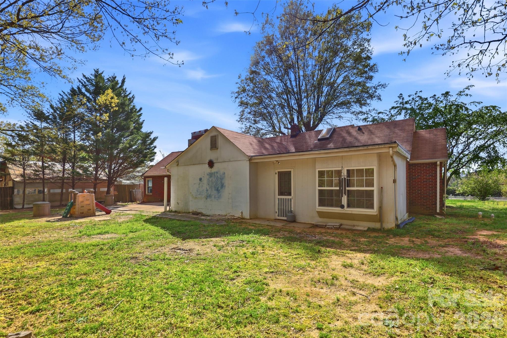 2670 North Olivers Road Newton, NC 28658 - Photo 21 of 27 a view of a house with a yard