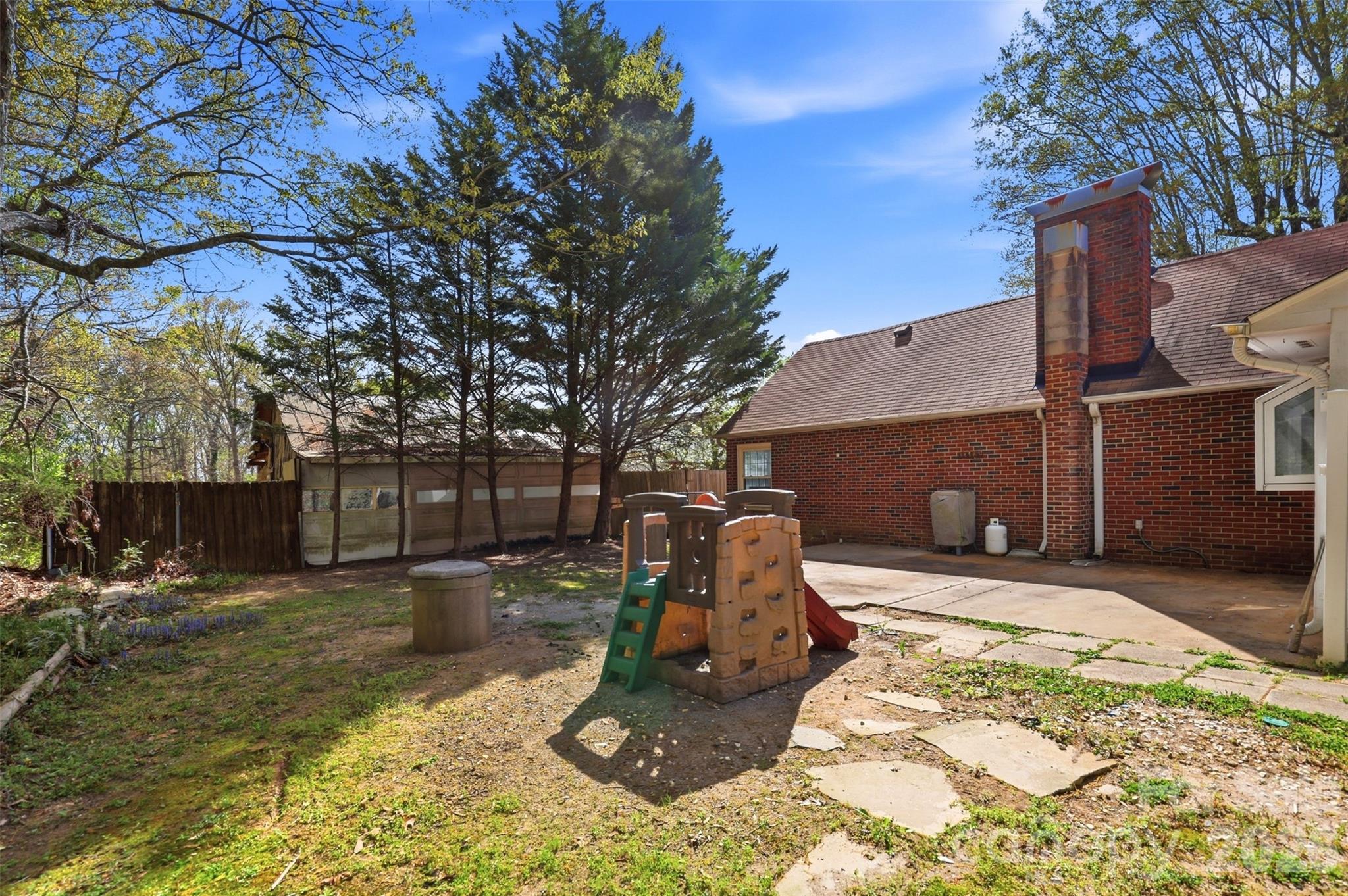 2670 North Olivers Road Newton, NC 28658 - Photo 24 of 27 a view of a backyard with a tree