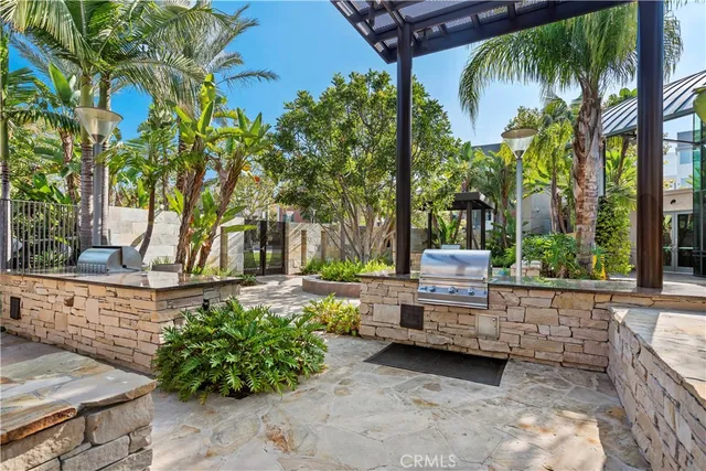 a view of a backyard with sitting area