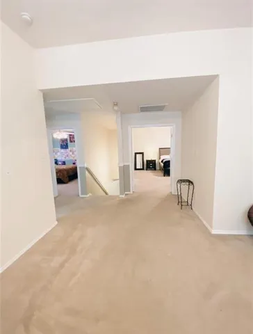 a open kitchen with stainless steel appliances kitchen island granite countertop a sink and cabinets
