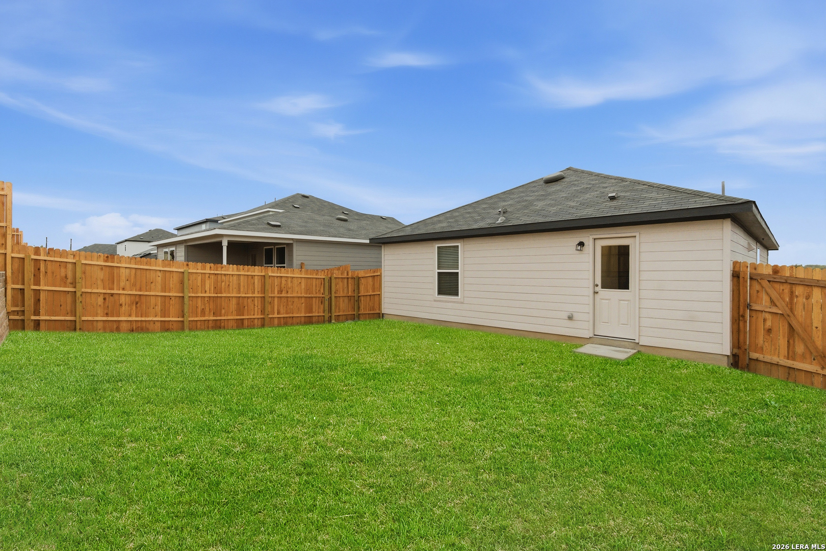 10107 Monte Carmel Place Adkins, TX 78101 - Photo 24 of 25 a view of a backyard of the house