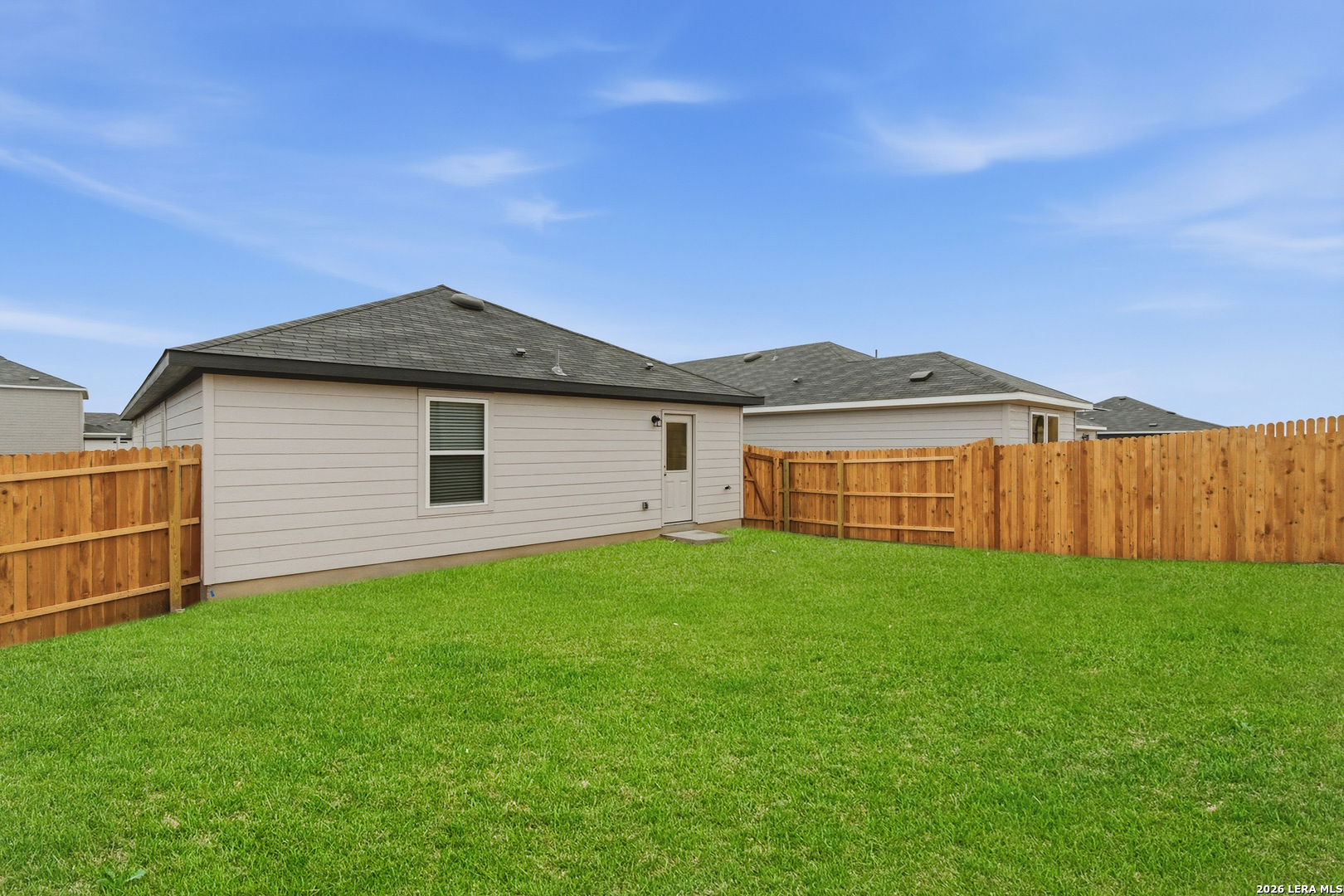10107 Monte Carmel Place Adkins, TX 78101 - Photo 25 of 25 a backyard of a house with lots of green space