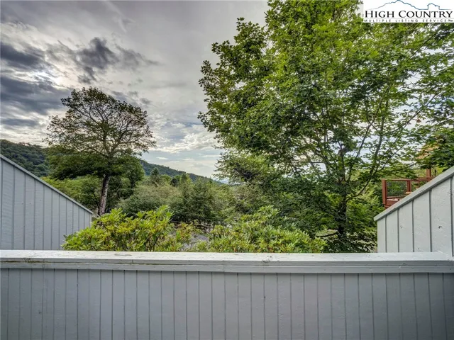 a view of a wooden fence