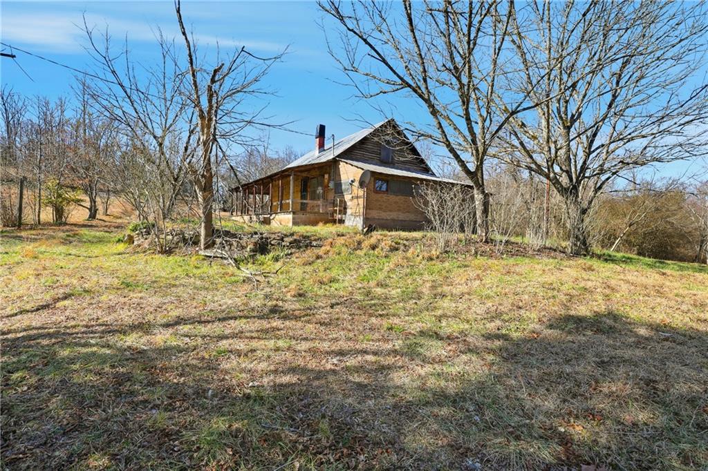 2558 Stonepile Road Clarkesville, GA 30523 - Photo 13 of 22 a front view of a house with a yard covered with snow