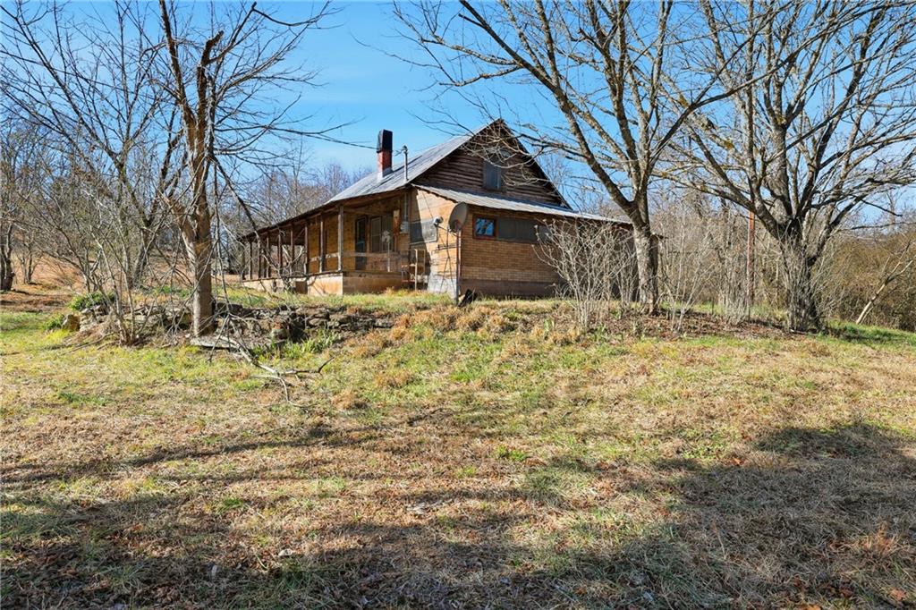 2558 Stonepile Road Clarkesville, GA 30523 - Photo 14 of 22 a front view of a house with a yard covered with snow
