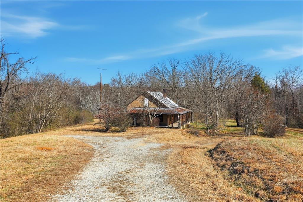2558 Stonepile Road Clarkesville, GA 30523 - Photo 16 of 22 a view of a yard with a house