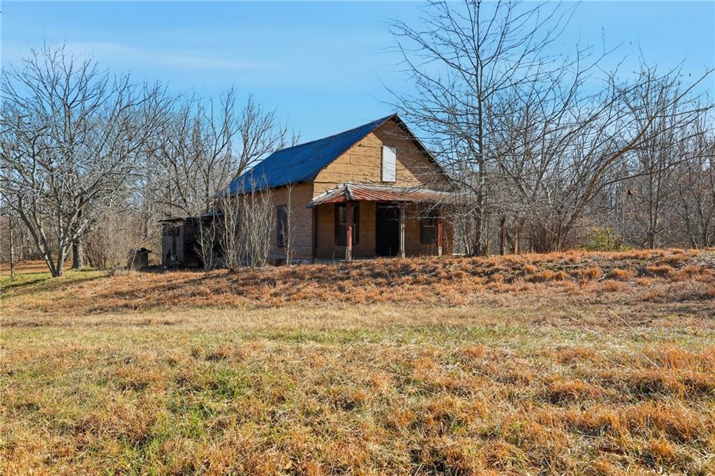 2558 Stonepile Road Clarkesville, GA 30523 - Photo 9 of 22 a front view of a house with a yard covered in snow