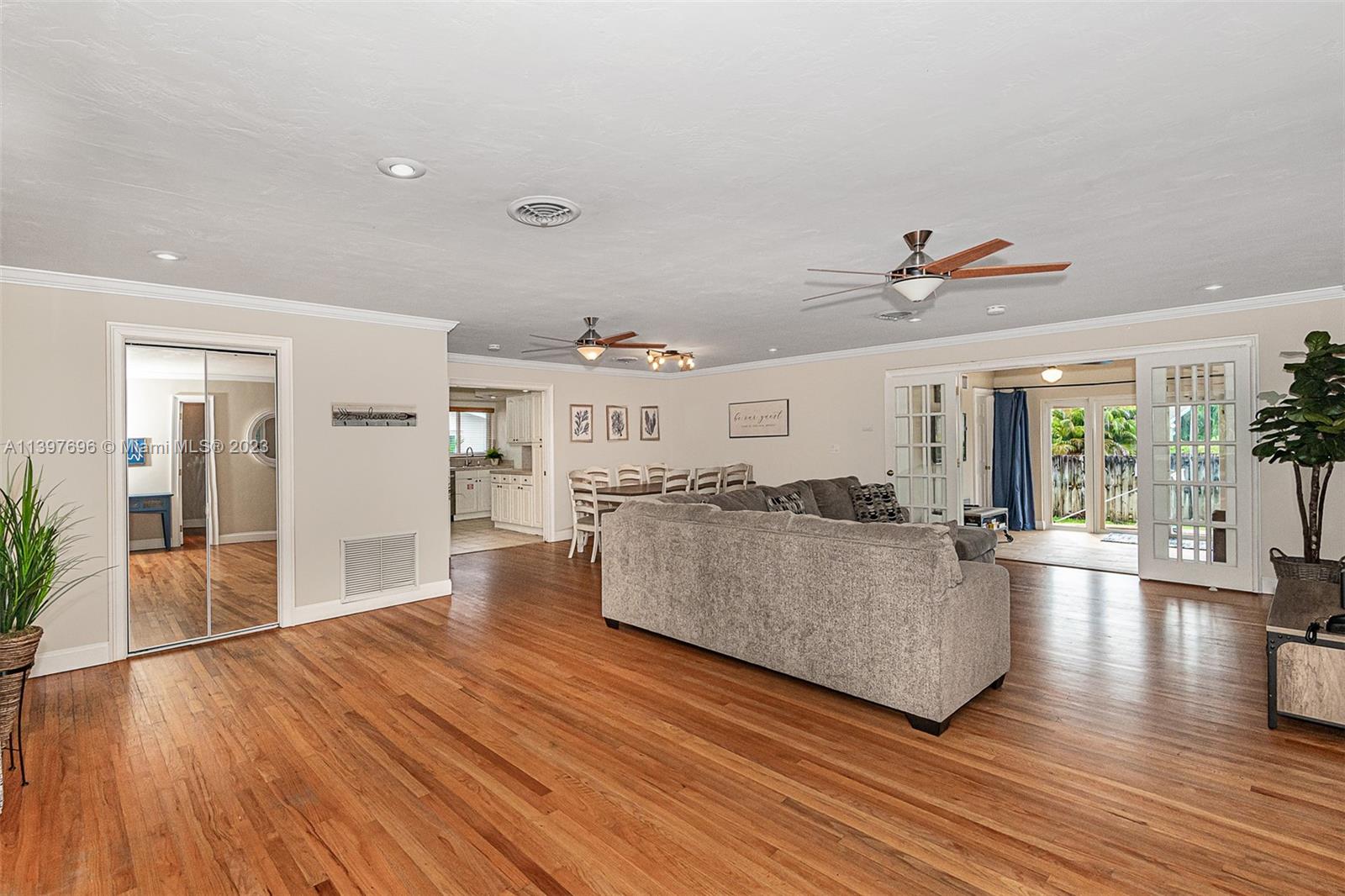 307 North Rainbow Drive Hollywood, FL 33021 - Photo 18 of 74 a living room with furniture and a large window