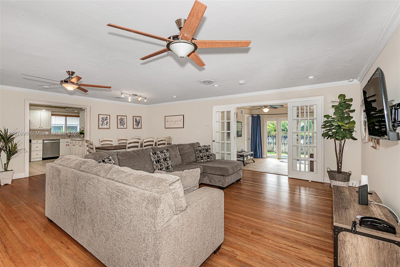 307 North Rainbow Drive Hollywood, FL 33021 - Photo 19 of 74 a living room with furniture and a large window