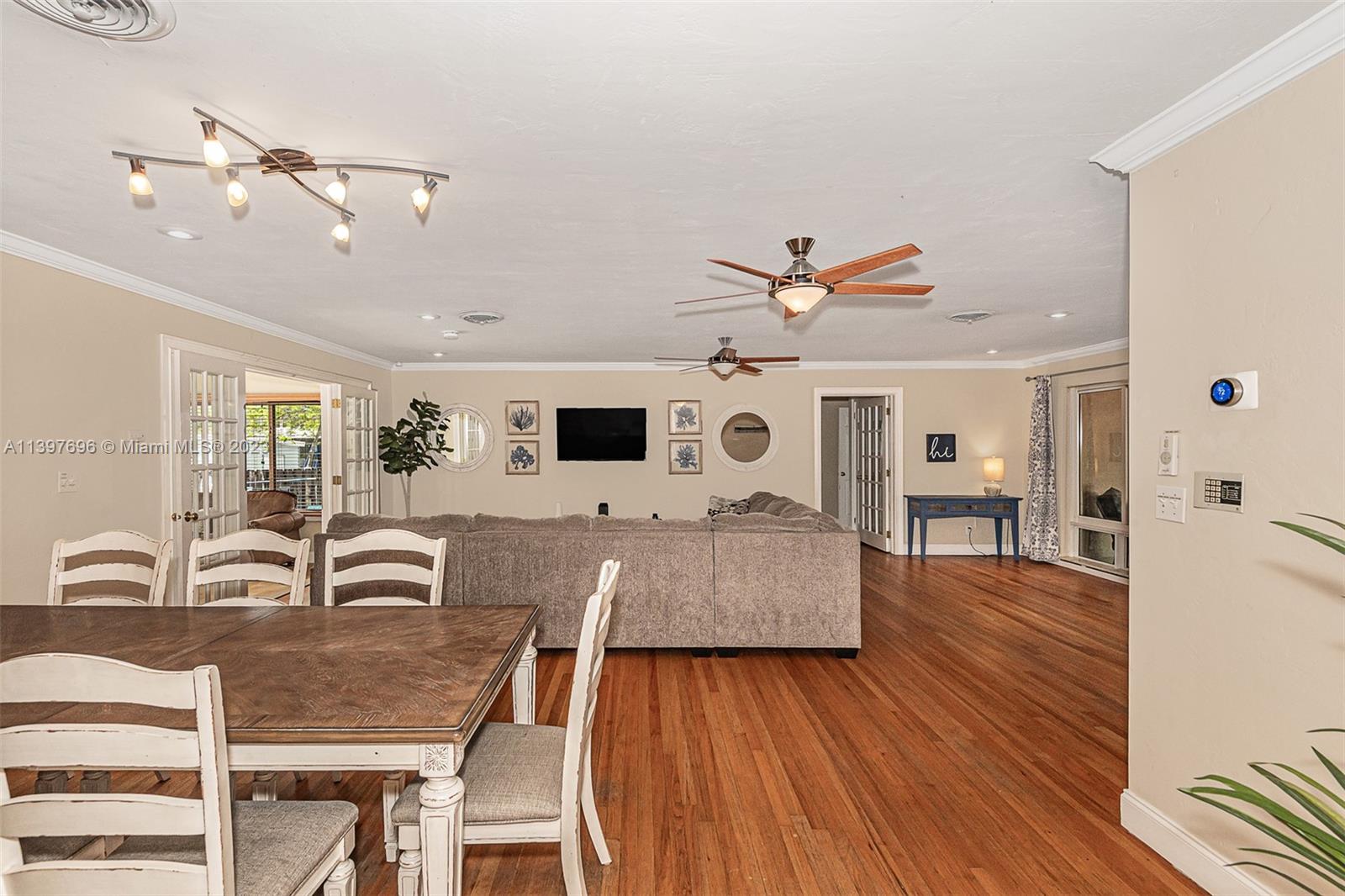 307 North Rainbow Drive Hollywood, FL 33021 - Photo 28 of 74 a living room with furniture and wooden floor