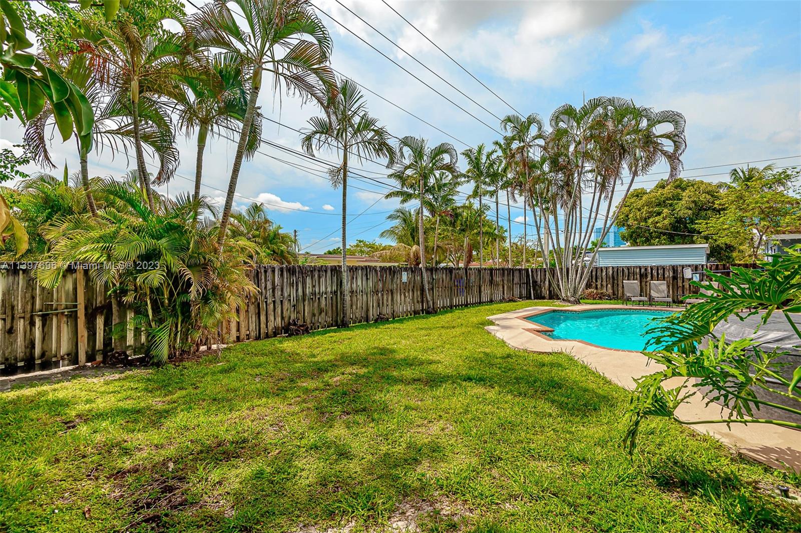 307 North Rainbow Drive Hollywood, FL 33021 - Photo 41 of 74 a view of a garden with a slide