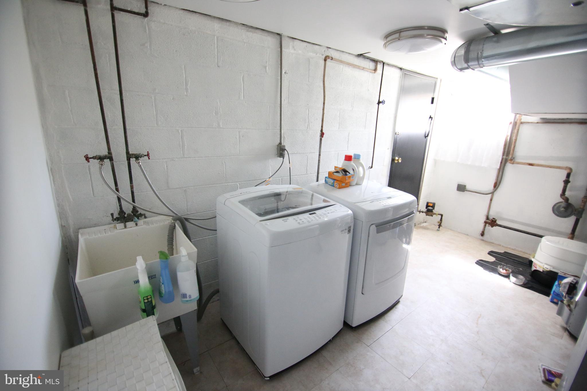 12604 Medford Road Philadelphia, PA 19154 - Photo 16 of 28 a utility room with dryer and washer