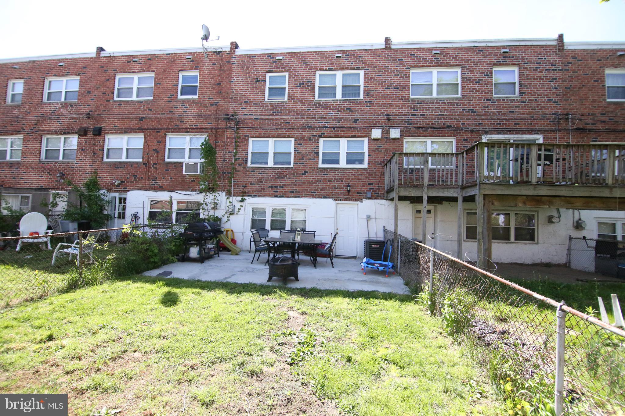 12604 Medford Road Philadelphia, PA 19154 - Photo 26 of 28 a front view of a house with swimming pool and chairs