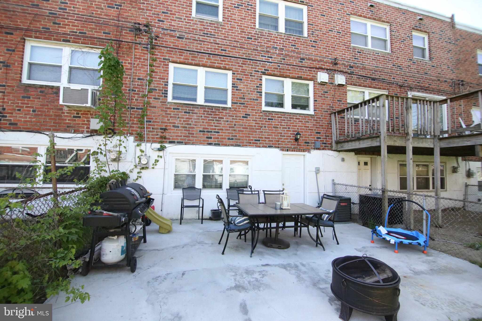 12604 Medford Road Philadelphia, PA 19154 - Photo 27 of 28 a view of a patio with table and chairs and potted plants