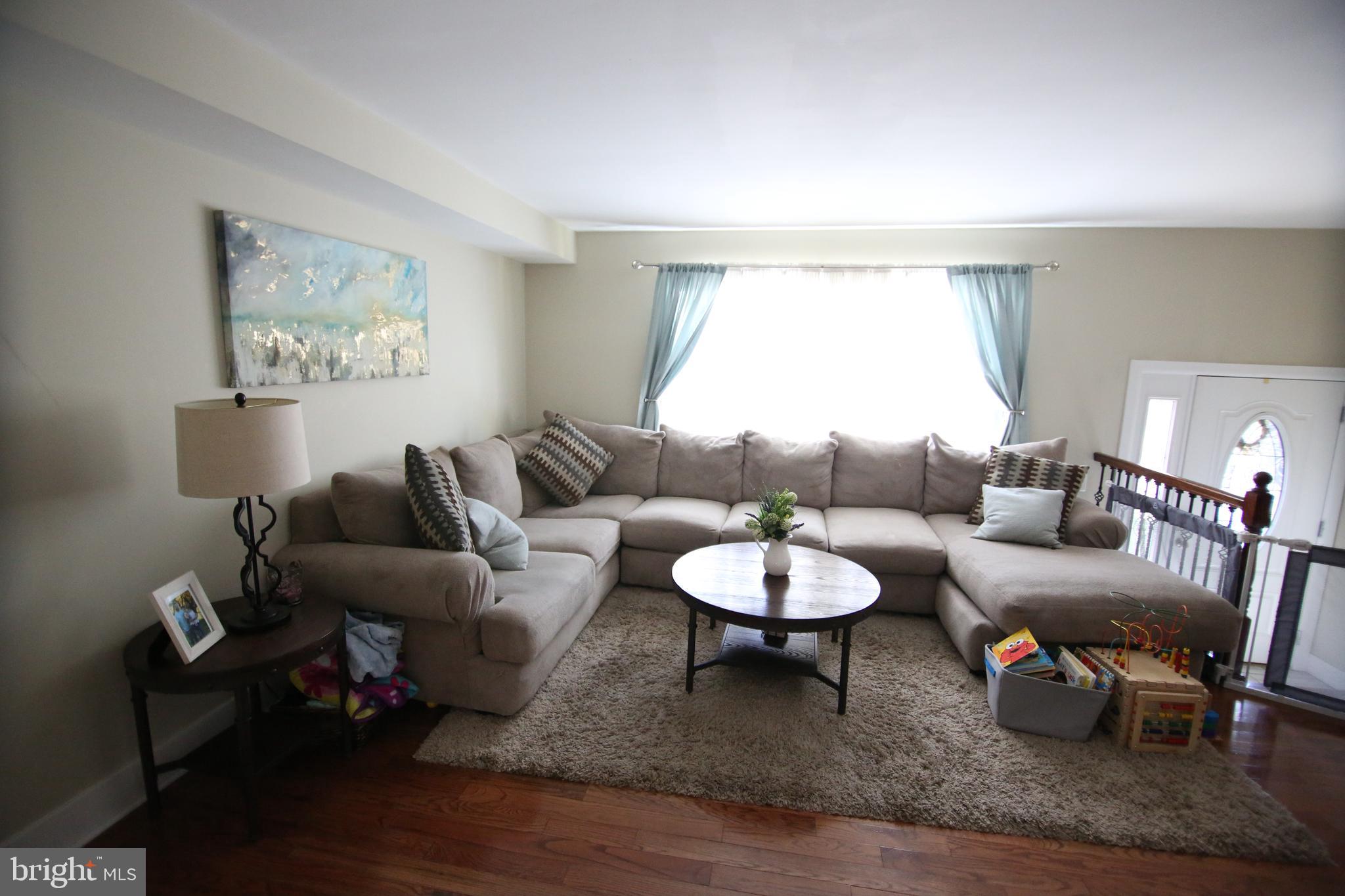 12604 Medford Road Philadelphia, PA 19154 - Photo 9 of 28 a living room with furniture and a window