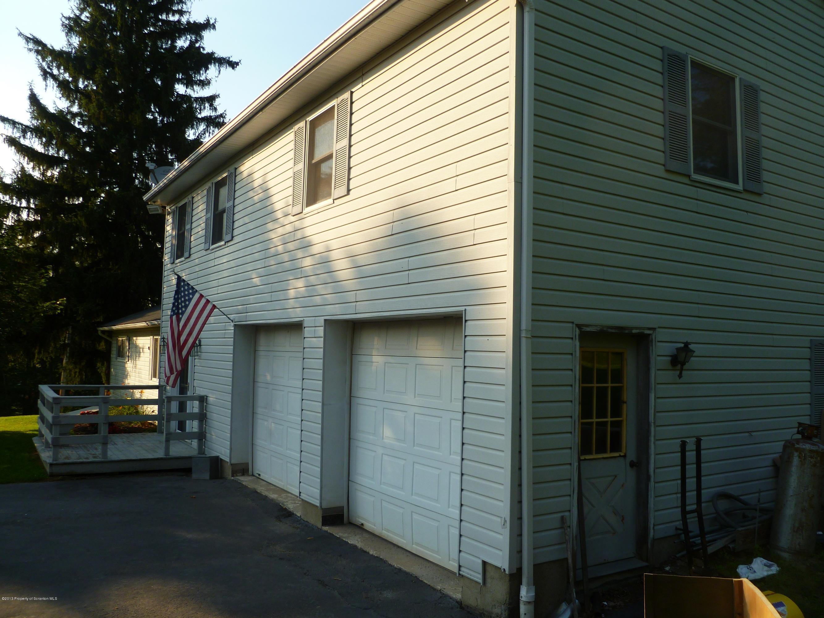 1250 Aberdeen Road Moscow, PA 18444 - Photo 13 of 32 a front view of a house with parking area