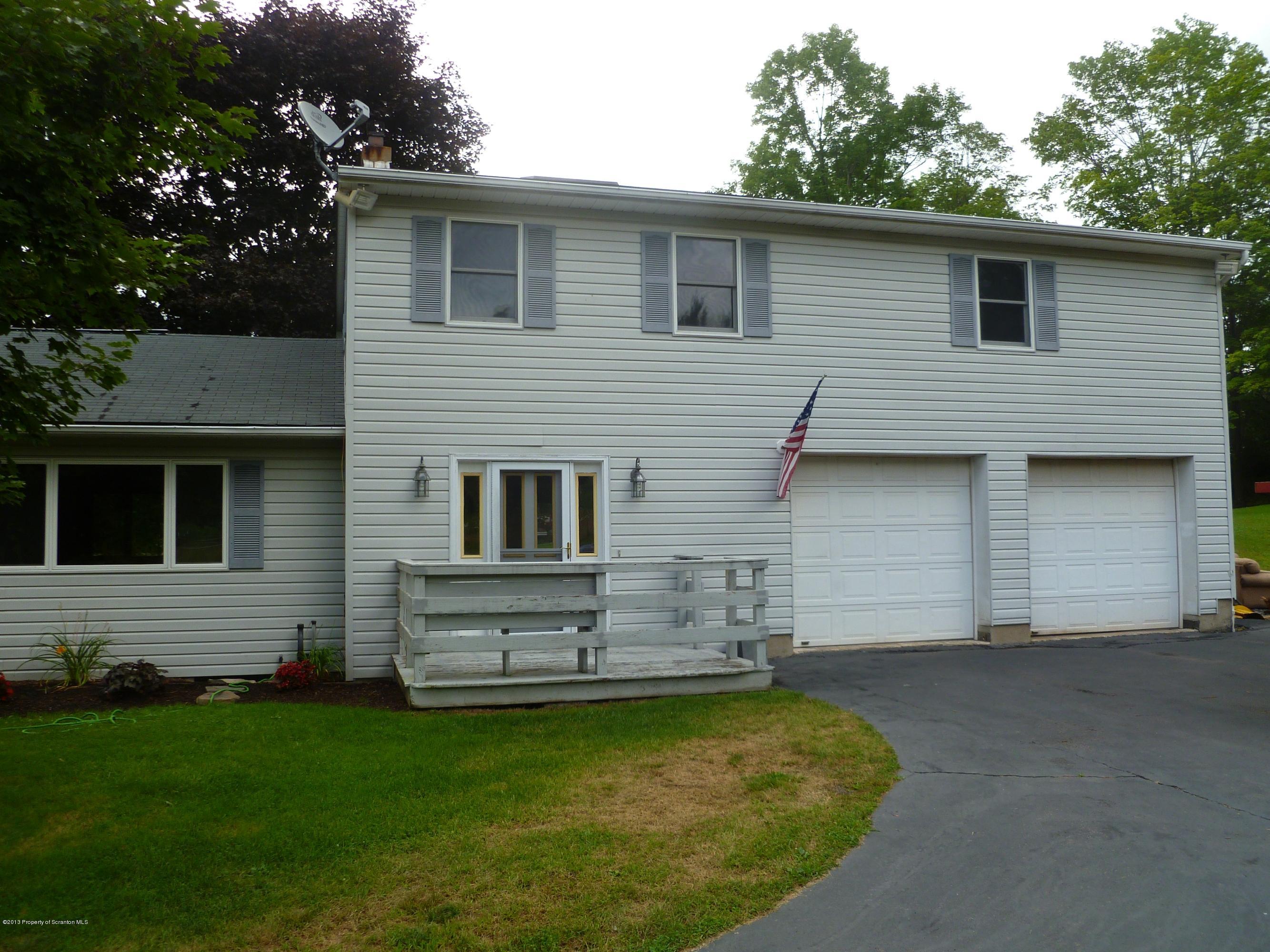 1250 Aberdeen Road Moscow, PA 18444 - Photo 17 of 32 a view of a house with a backyard