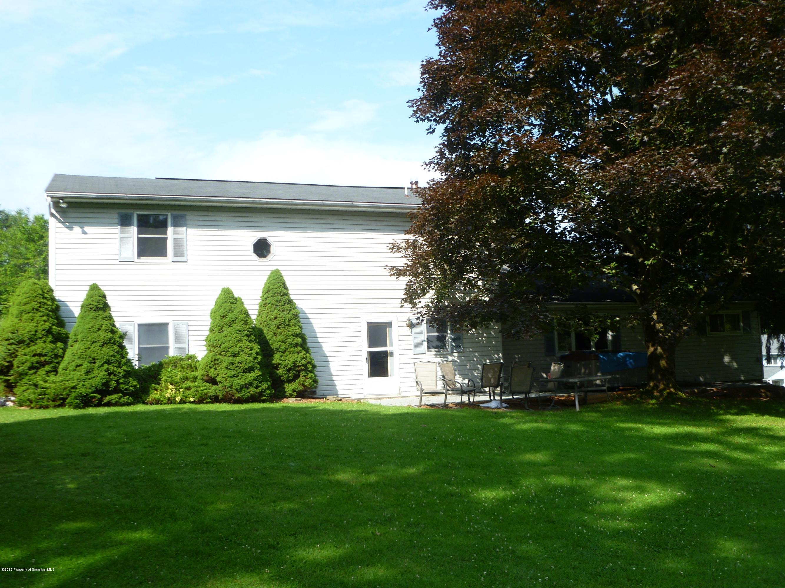 1250 Aberdeen Road Moscow, PA 18444 - Photo 19 of 32 front view of a house with a yard