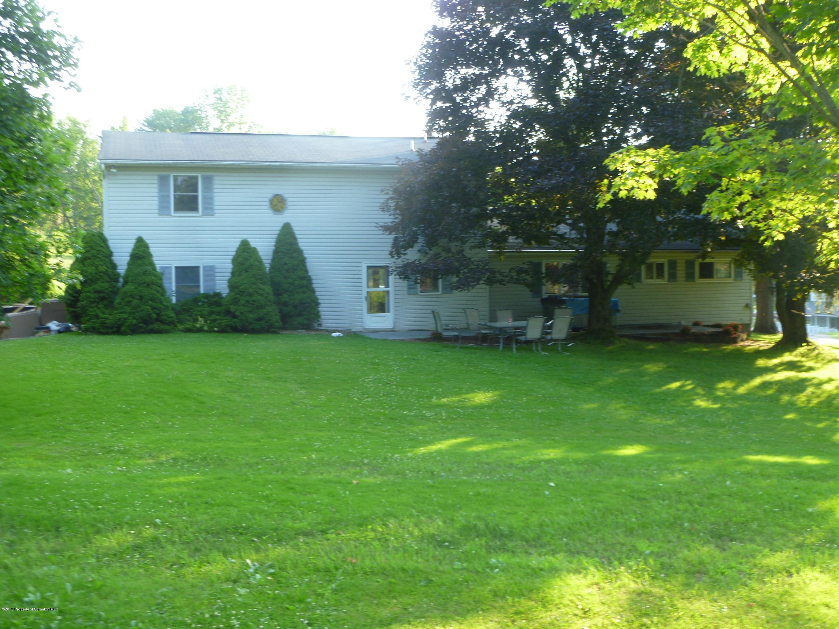 1250 Aberdeen Road Moscow, PA 18444 - Photo 20 of 32 a view of a house with a backyard