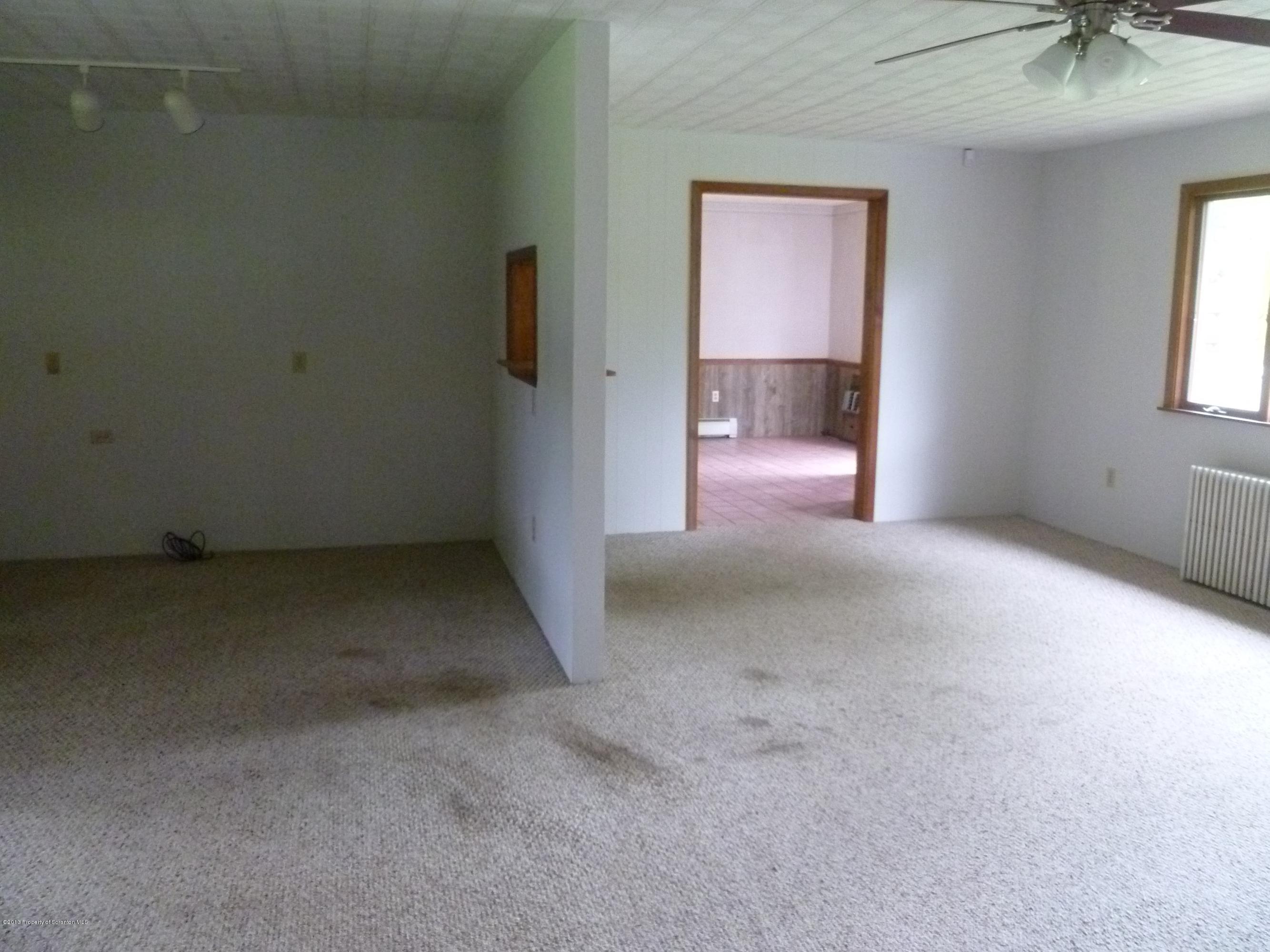 1250 Aberdeen Road Moscow, PA 18444 - Photo 21 of 32 a view of a room with a ceiling fan and window