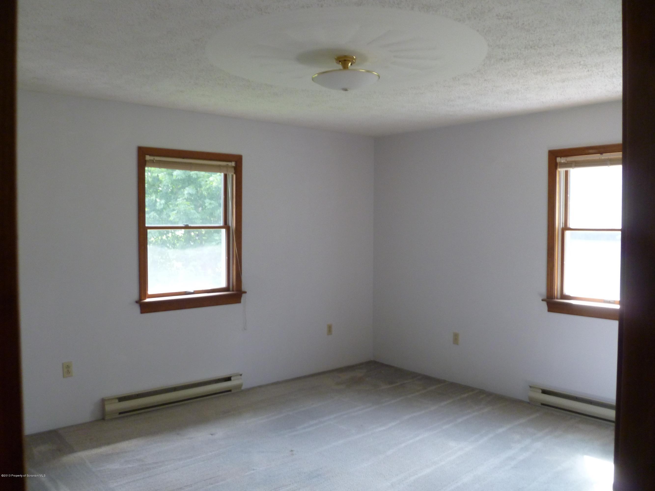 1250 Aberdeen Road Moscow, PA 18444 - Photo 6 of 32 an empty room with a window