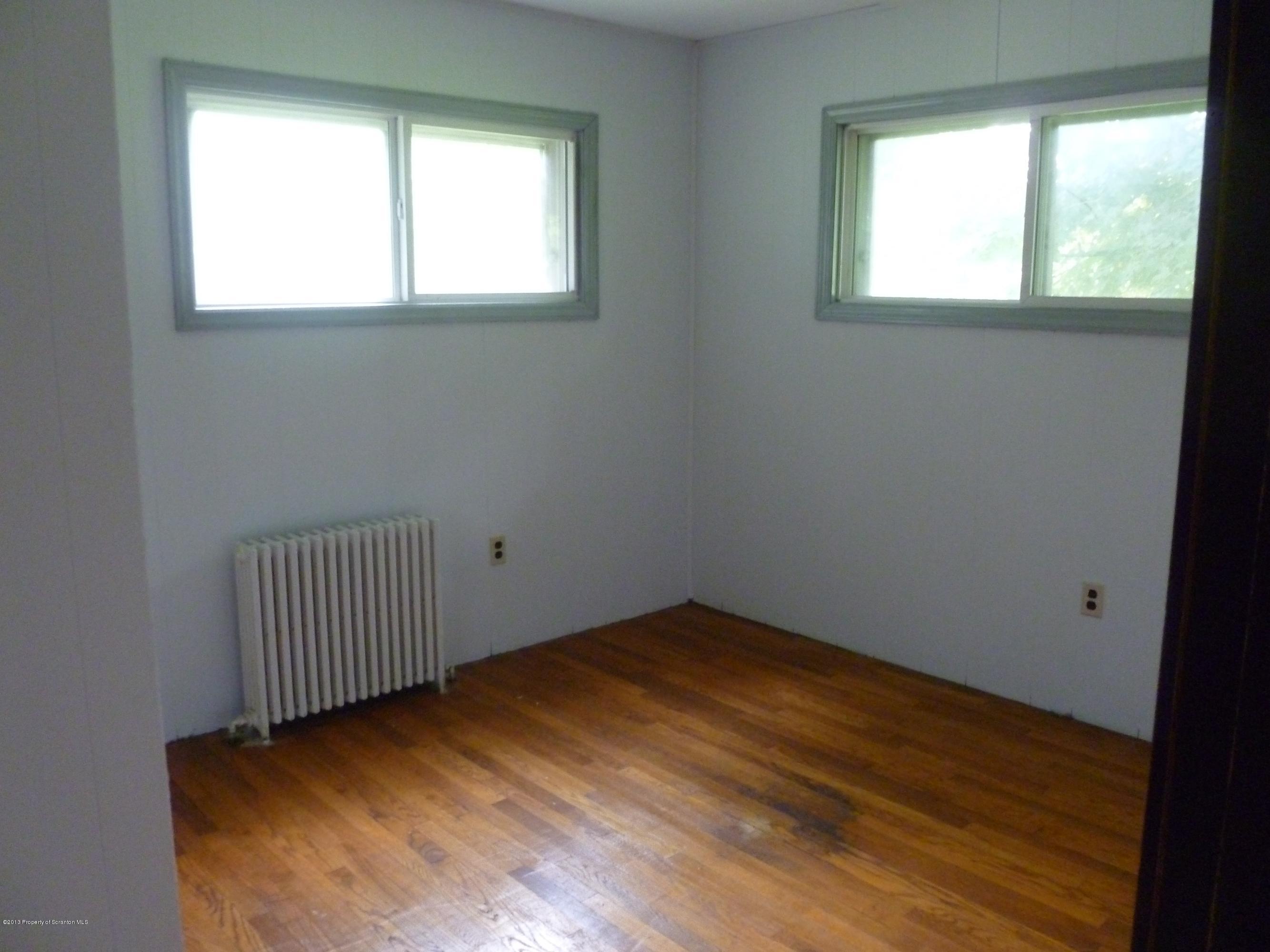 1250 Aberdeen Road Moscow, PA 18444 - Photo 8 of 32 an empty room with a window